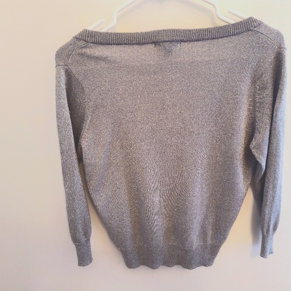 UK to LA silver top. Size Large. Color silver. Good condition - Picture 5 of 5